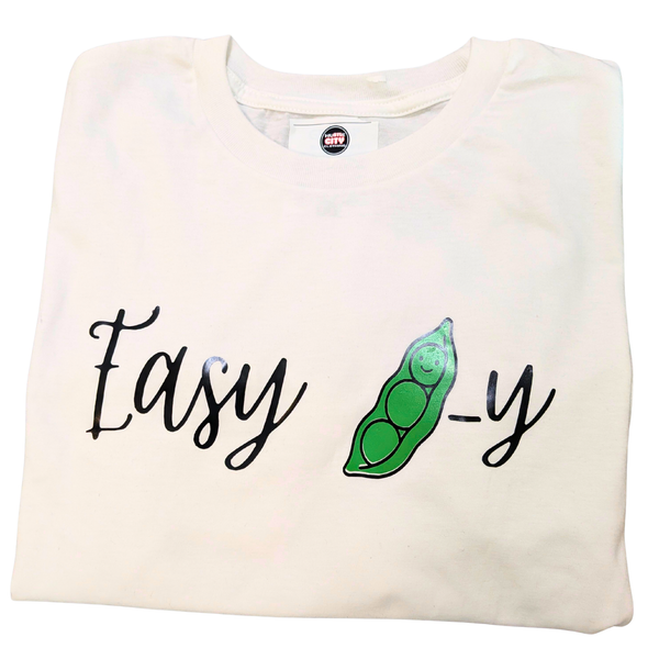 Folded white crop top with Easy Peasy text and a green graphic.
