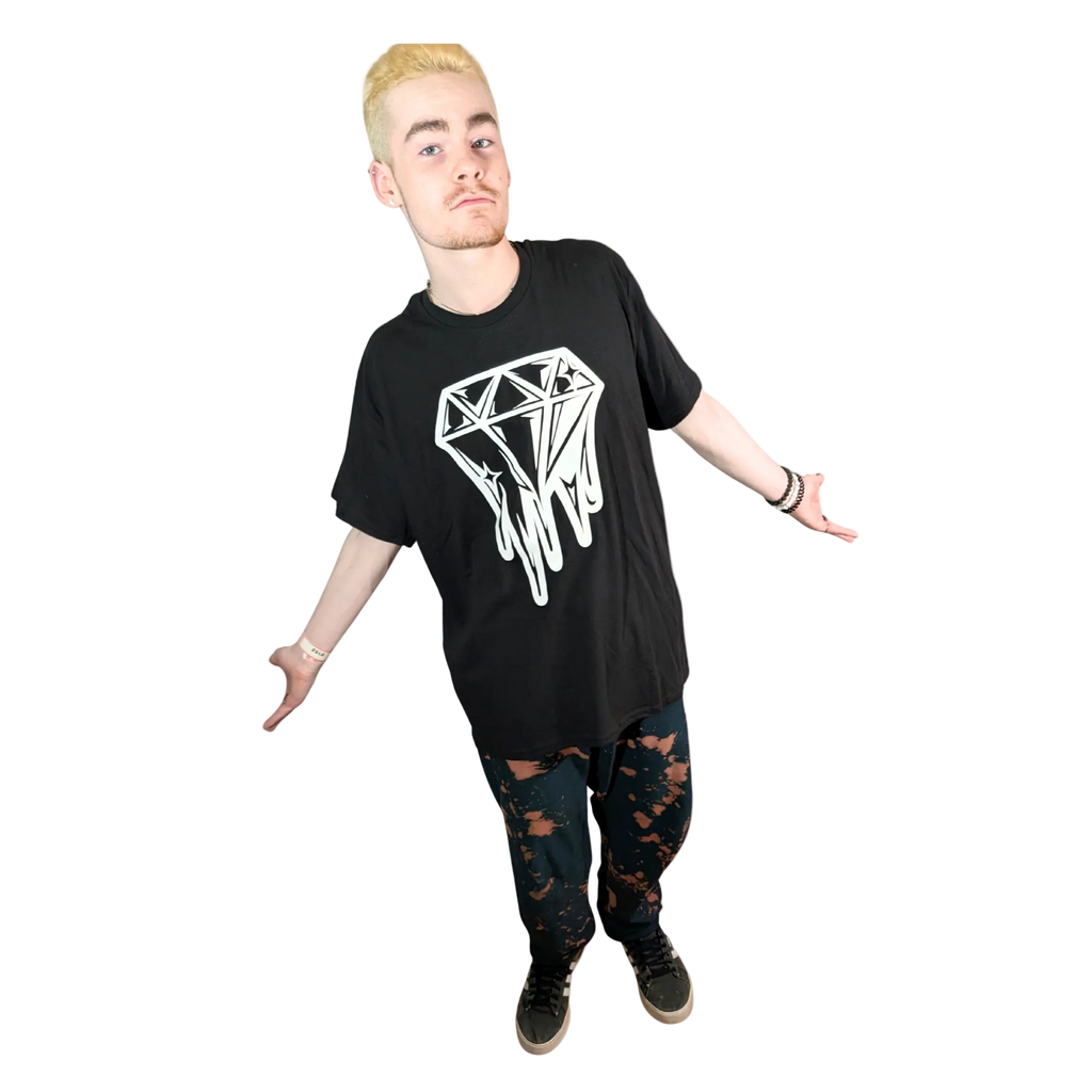 Person wearing a black t-shirt with a white graphic design on a white background