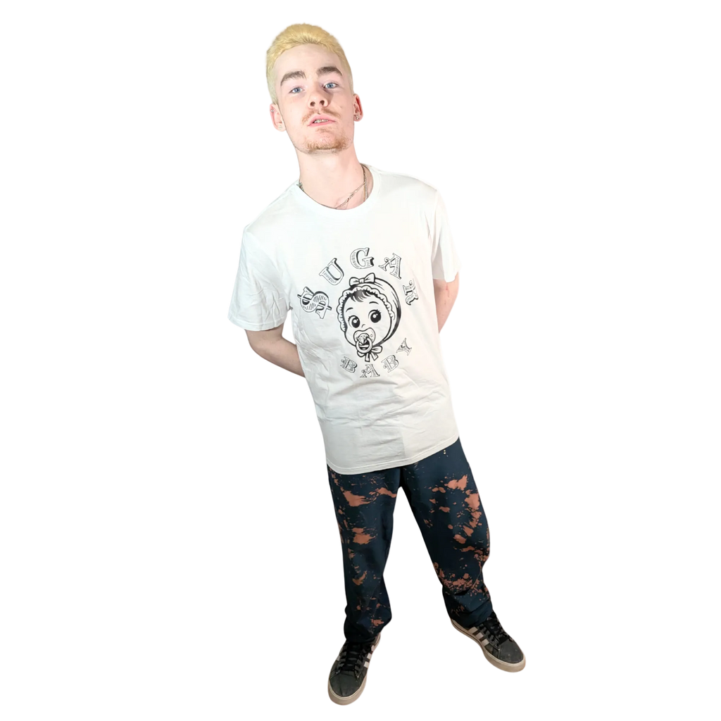 Person wearing a white t-shirt with a graphic design on a white background