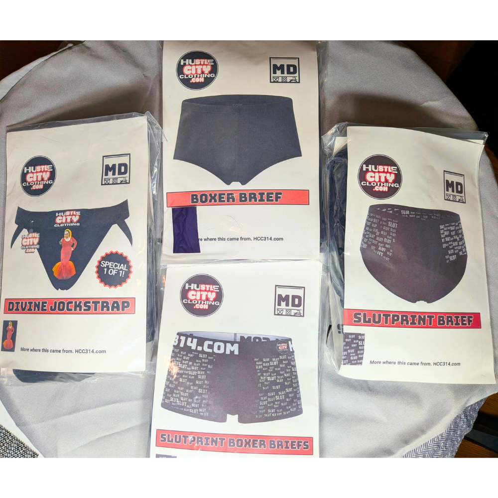 Packaged boxer briefs with visible branding on boxes.