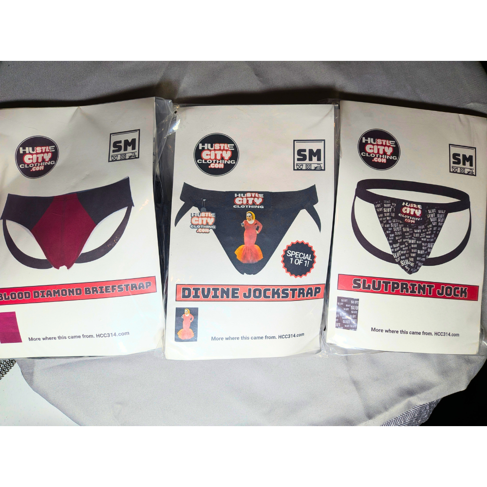 Three packages of Hustle City Clothing with product images and labels on a gray background.