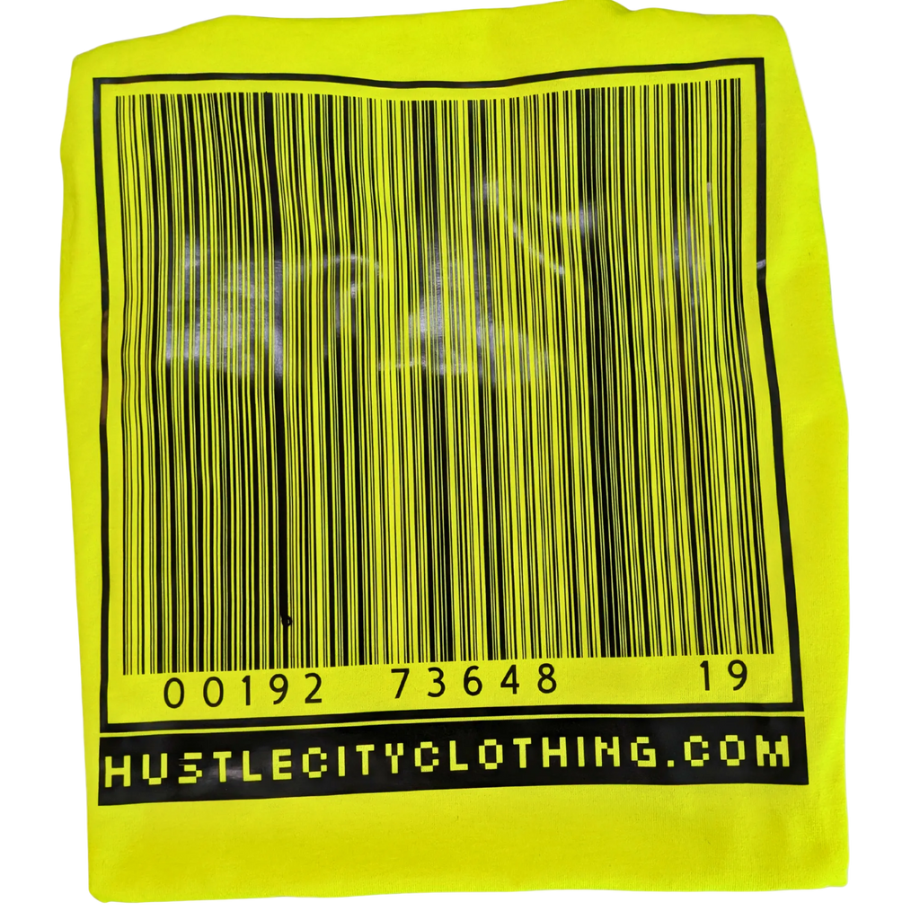 Yellow towel with a barcode and 'Hustle City Clothing.com' text on a white background