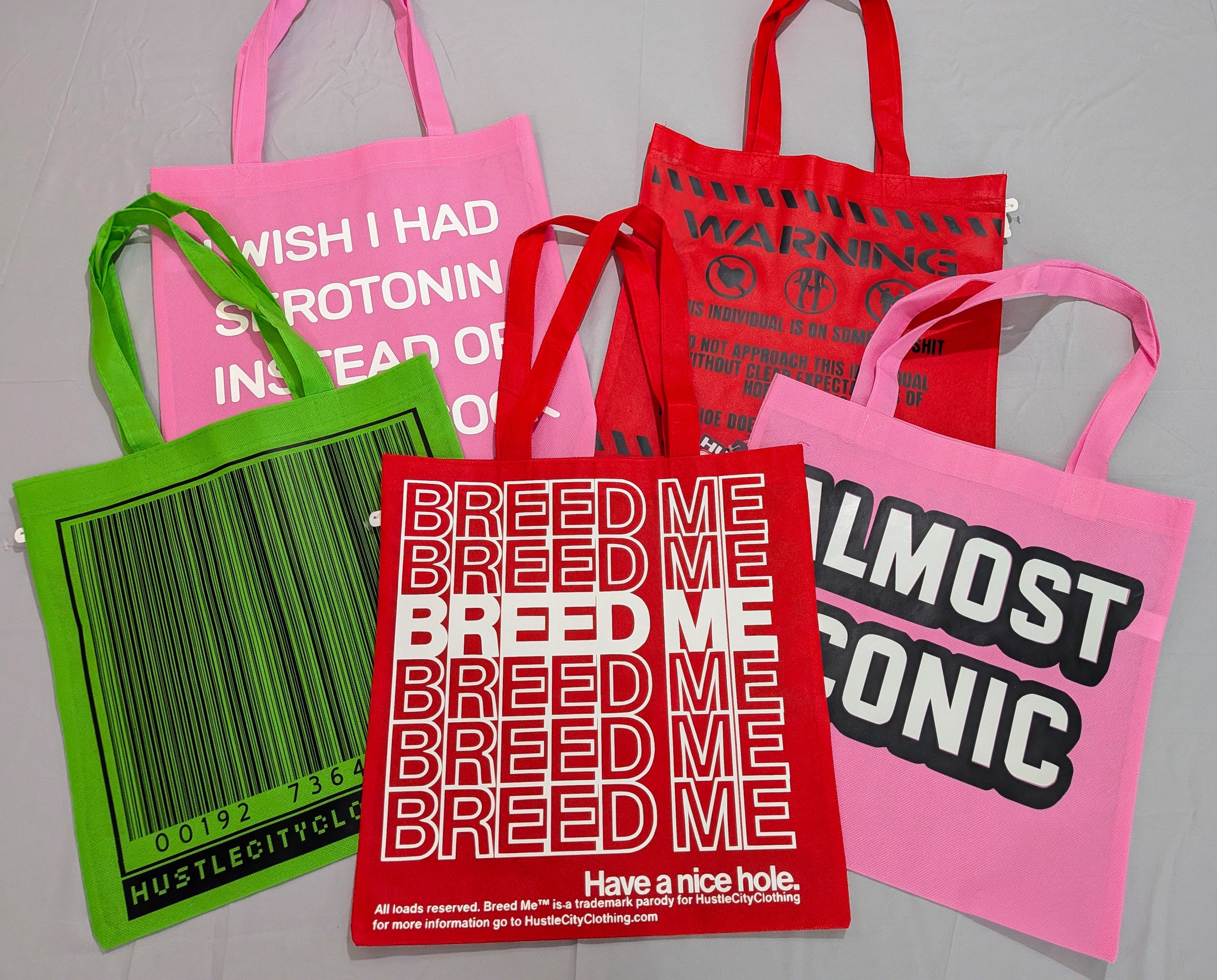 Five colorful tote bags with various text designs on a gray background