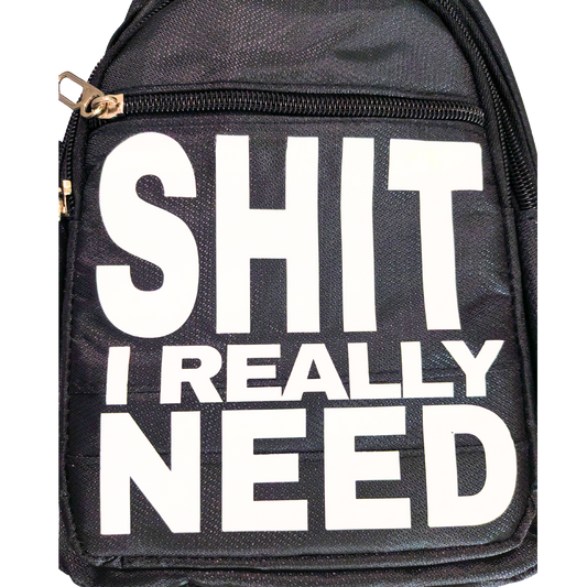 Black bag with white text 'SHIT I REALLY NEED' on a white background