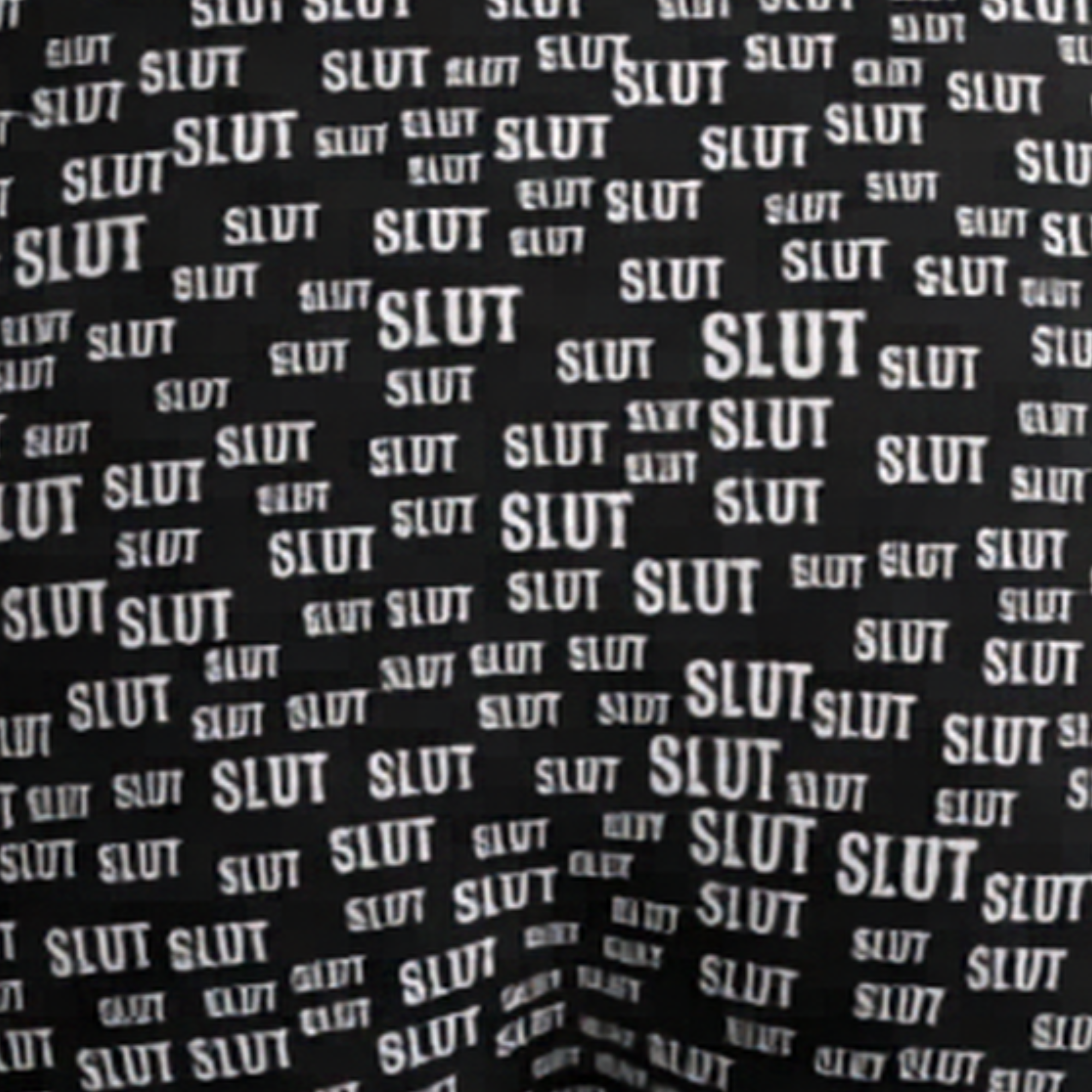 Pattern of the word 'SLUT' repeated multiple times on a black background